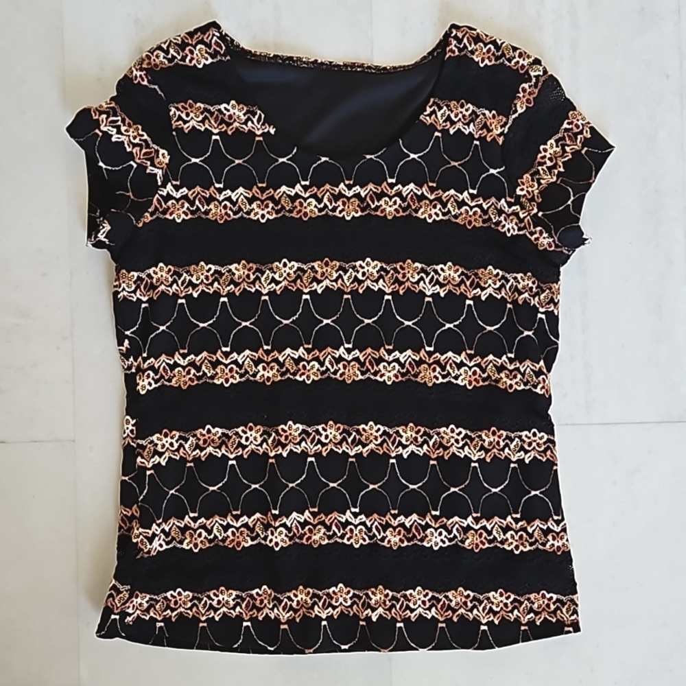 Womens black pattern top with embroidered design